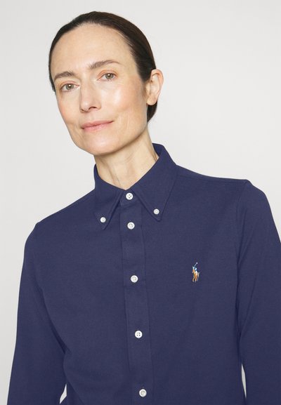 RL – Women's button-down shirt