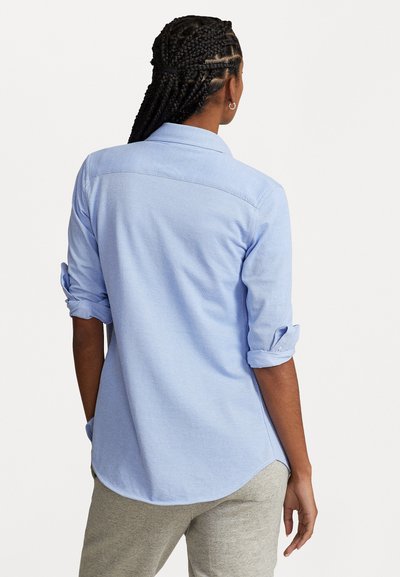 RL – Women's button-down shirt